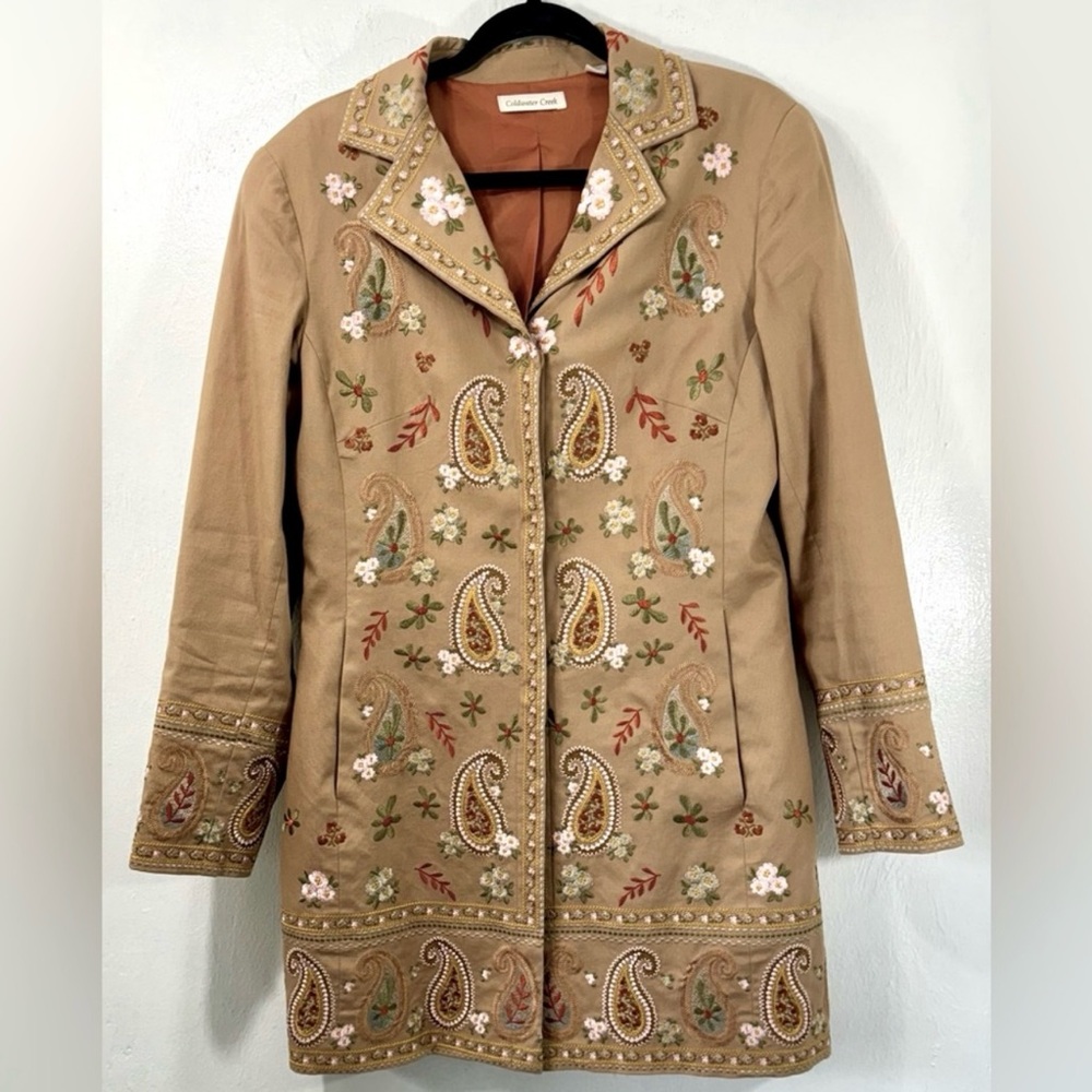 Coldwater Creek-Tan heavily trench coat embroidered on front and back.Size 10